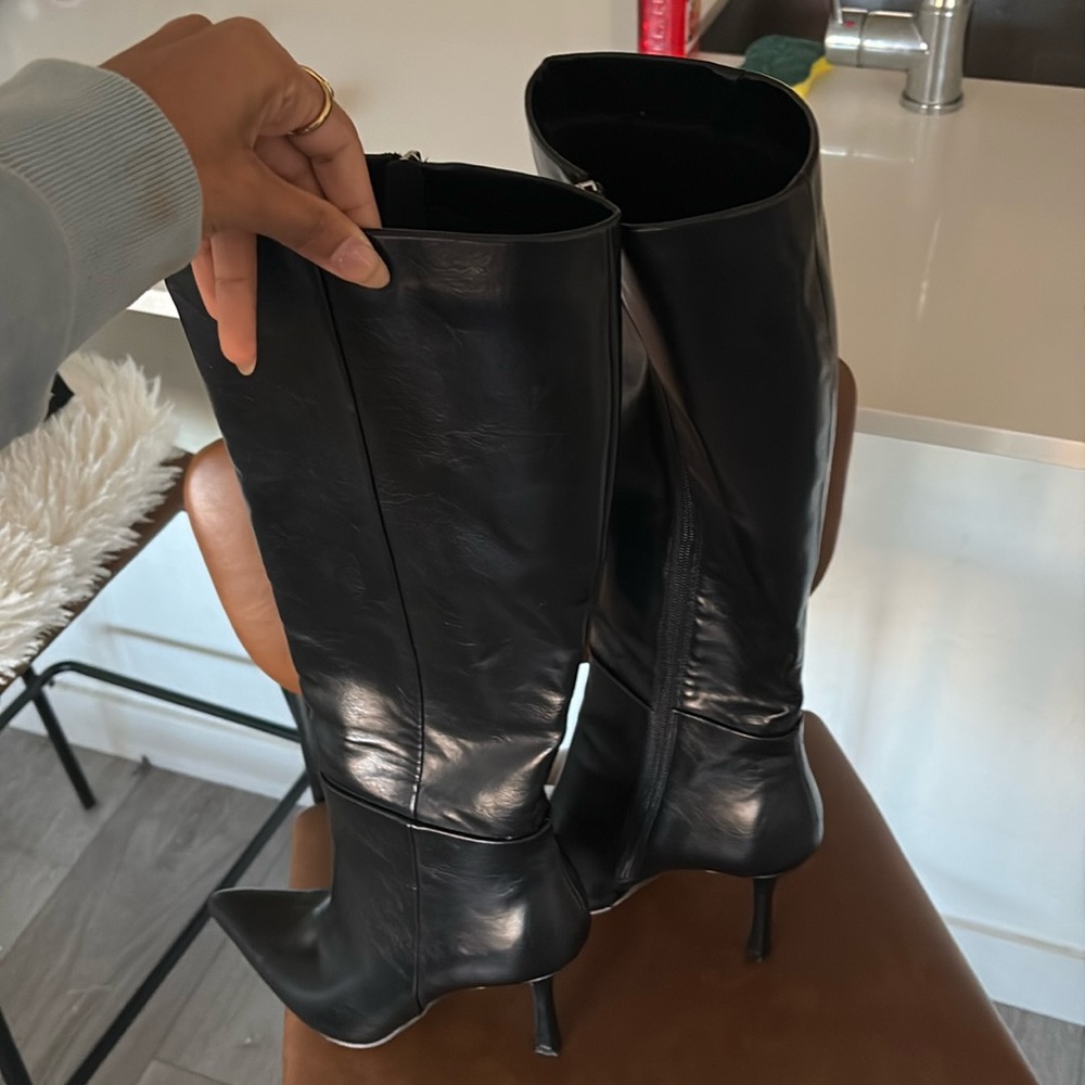 Tall black boot heel